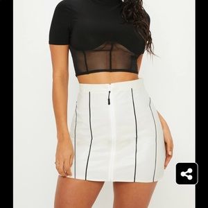 Cream faux leather contrast piping mini skirt